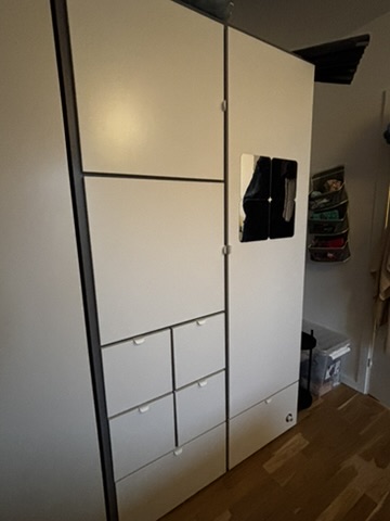 White cupboard with drawers - angle